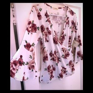 *NWT- Bell sleeve top with wrap around style*